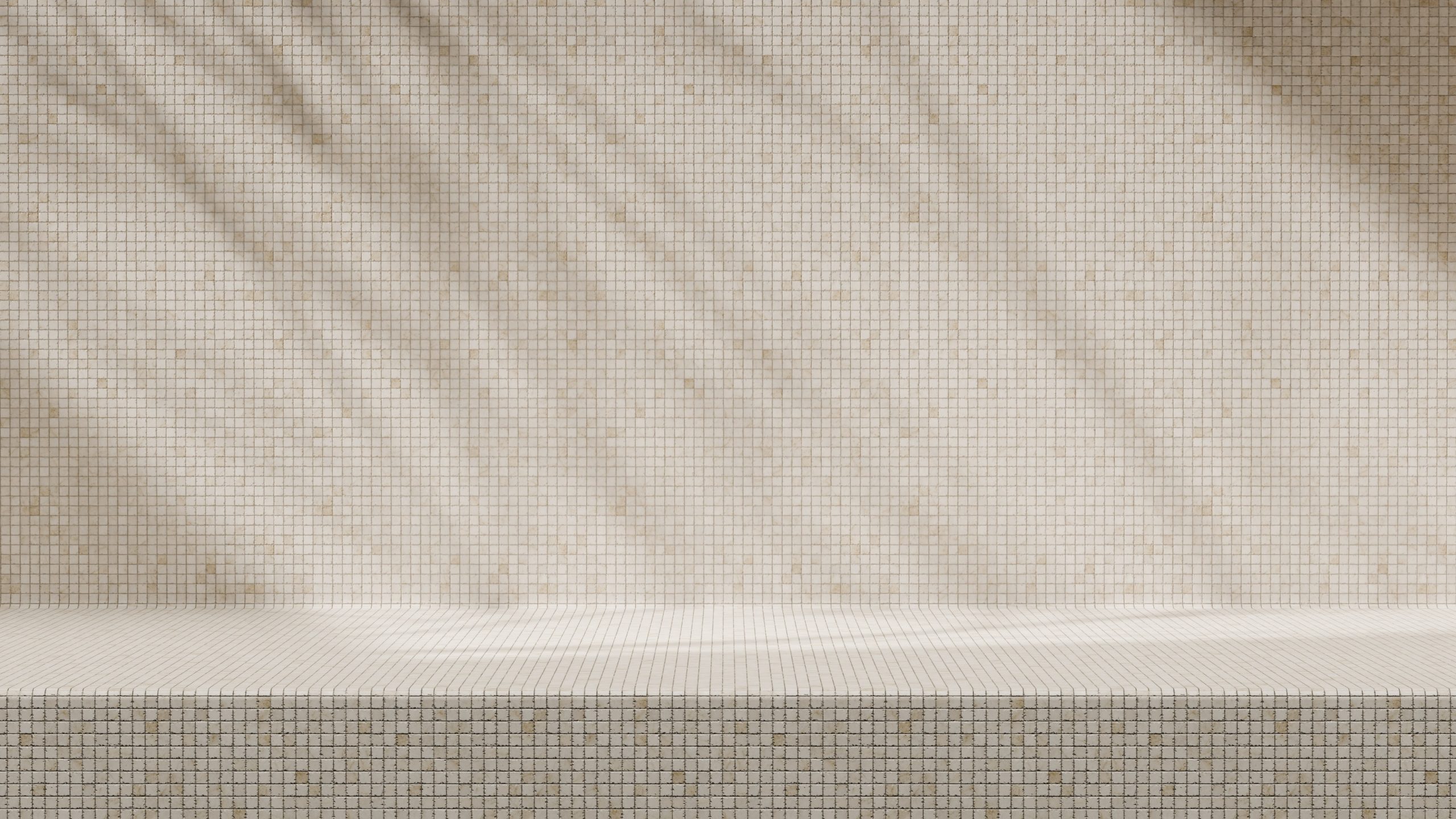 Neutral mosaic tile wall and bench creating a calm, minimalist interior atmosphere